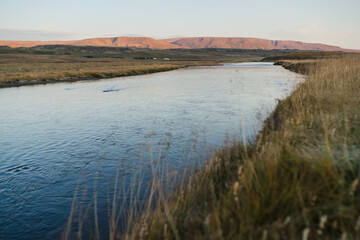 Traveling and exploring Iceland landscapes and famous places. Autumn tourism by Atlantic Ocean and mountains. Outdoor views on beautiful cliffs and travel destinations.