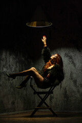 person sitting on a chair in the night