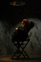 person sitting on a chair in the night