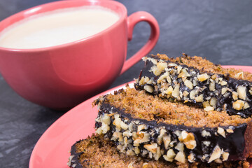 Fresh baked pastry made of zucchini and cup of white coffee. Delicious dessert