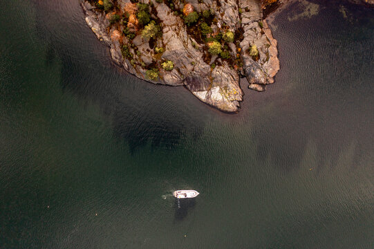Yacht anchored near nature from above