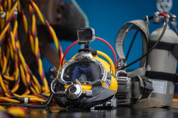 Commercial diving helmet closeup photo with gear