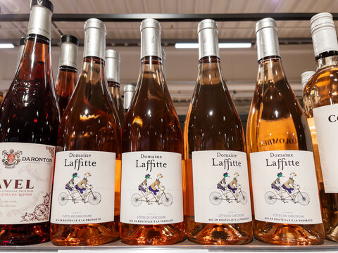 Assorted Rose Wine Bottles on a Store Shelf