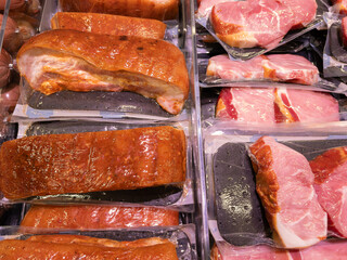 Assorted Meat Products in Packaging on Display