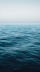 Fototapeta na wymiar Blue ocean water background. View of sea water and sky