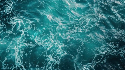 Blue sea water texture background. Close up view of ocean waves.