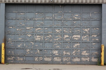 Old industrial factory garage door.
