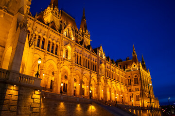 Fototapeta na wymiar Parliament building illuminated at night in Budapest, Hungary
