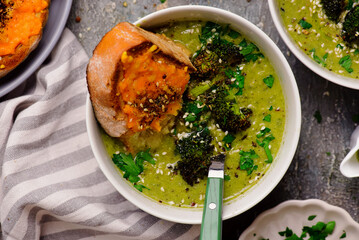 Roasted broccoli soup with melted cheddar croutons.style hugge.selective focus