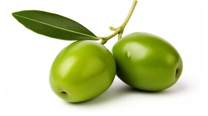 Obraz premium Two vibrant green olives, accompanied by leaves, stand alone against a white background in isolation.