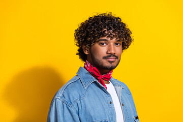 Obraz premium Photo portrait of handsome young guy shopping model poster wear trendy denim garment red scarf isolated on yellow color background