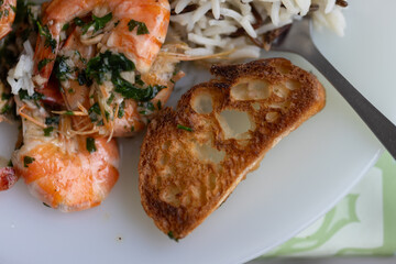 Fried shrimp with parsley well done toast and rice