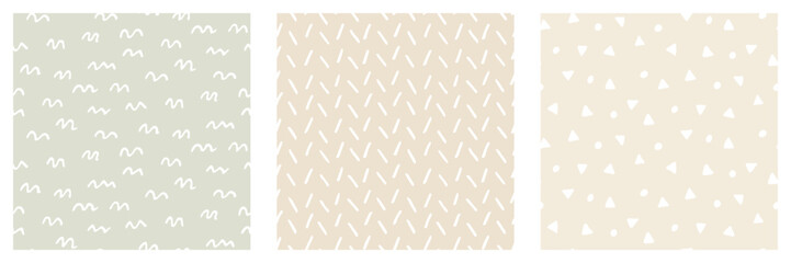 Set of cute seamless patterns in doodle style. White squiggles drawn by hand. Abstract strokes minimal background. Great for Baby design, nursery wallpaper, fabric print