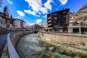 Matter-Vispa river of glacial melt water in the luxury car-free ski resort of Zermatt in the Canton of Valais, Switzerland