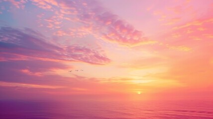 Naklejka na ściany i meble Pastel sunset sky with birds over serene ocean - Peaceful, pastel-hued sunset sky with birds flying over a calm ocean, evoking a sense of tranquility and wonder