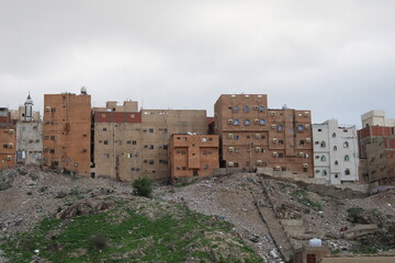 Fototapeta na wymiar An old residential area on a hill in Mecca. adobe houses. Mecca, Saudi Arabia