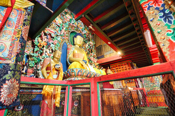 Buddha deity at the Dawa Choling Tibetan Monastery in Tengboche, largest gompa in the Himalayas,Nepal - obrazy, fototapety, plakaty
