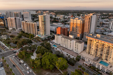 Sarasota, Florida city downtown at sunset with expensive waterfront high-rise buildings. Urban...