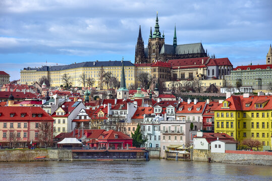 Cityscape of Prague with medieval towers and colorful buildings, Czech Republic