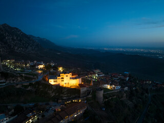 Fototapeta na wymiar Area night view of Kruje castle in Albania in afternoon sky