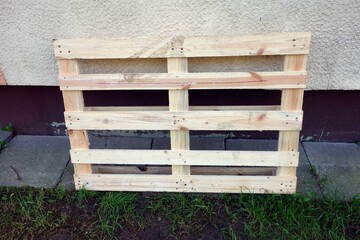 One-time pallet of pine boards used to secure and transport goods