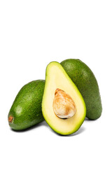 Avocados isolated on white background with clipping path. A pile of sliced avocados.