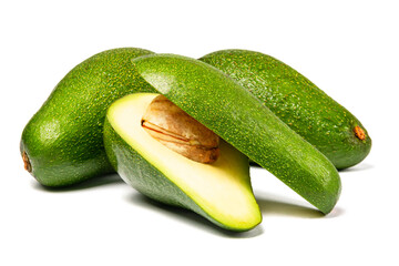 Avocados isolated on white background with clipping path. A pile of sliced avocados.