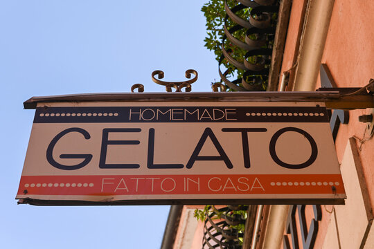 Shop sign for a shop selling homemade ice cream, hanging on a wall outside the shop, in Peschiera del Garda, Veneto, Italy.