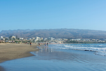 Sandy beach of Maspalomas with a view of the city on Gran Canaria, Spain