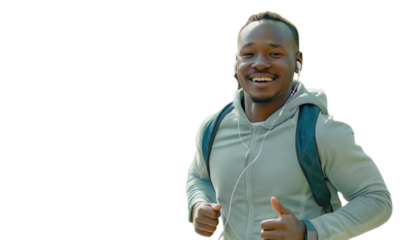 A happy young african man running.