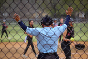 Umpire calling time during softball game