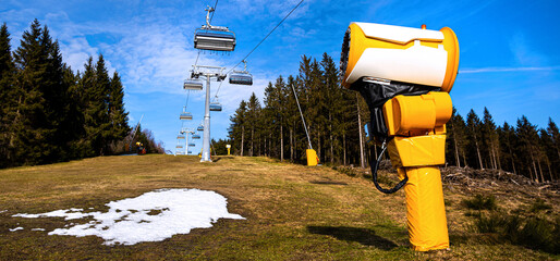 a ski slope in spring without snow