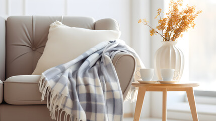 Warm and Cozy Blanket Draped on Armchair Creating Inviting Living Space