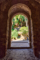 Alcazaba Castle in Malaga, Gate to the Courtyard. Costa del Sol, Spain - obrazy, fototapety, plakaty