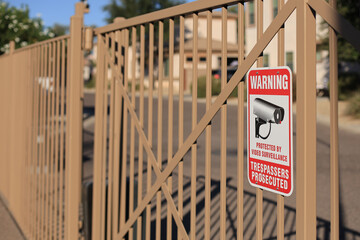 Warning Sign at Residential Housing Community Entrance Gate - obrazy, fototapety, plakaty
