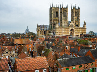 Tourists walking along the busy streets of the city of Lincoln. City Life Editorial The Hustle And...