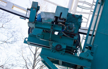 Old industrial metal electric motor, Ferris wheels. Iron dilapidated engine.