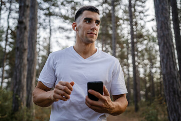 man use mobile phone smartphone during training