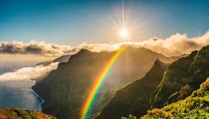 beautiful sunset with rainbow over the mountains madeira island portugal