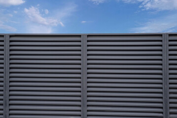 Modern metal profile fence with shutters or blinds