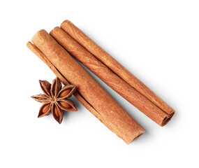 Cinnamon sticks and anise star isolated on white, above view