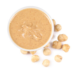 Delicious nut butter and hazelnuts isolated on white, top view