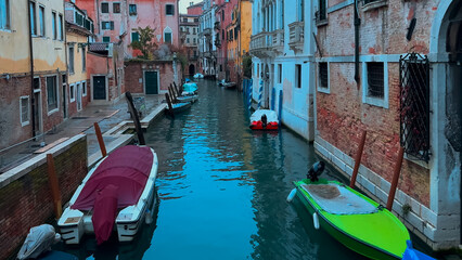 Medieval houses, narrow canals, bridges, gondolas in Venice, Italy, February 10, 2024. High quality 4k footage - obrazy, fototapety, plakaty