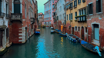 Fototapeta na wymiar Medieval houses, narrow canals, bridges, gondolas in Venice, Italy, February 10, 2024. High quality 4k footage