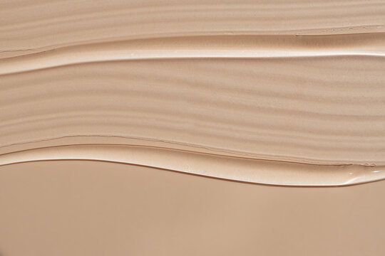 Cosmetic foundation and serum swatches on surface