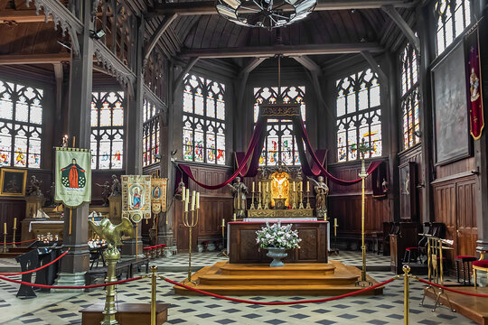 Interior and decor of Saint Catherine church in Honfleur. Saint-Catherine is one of the oldest and largest wooden churches in France (from 15th century). Honfleur, France. July 2, 2022.