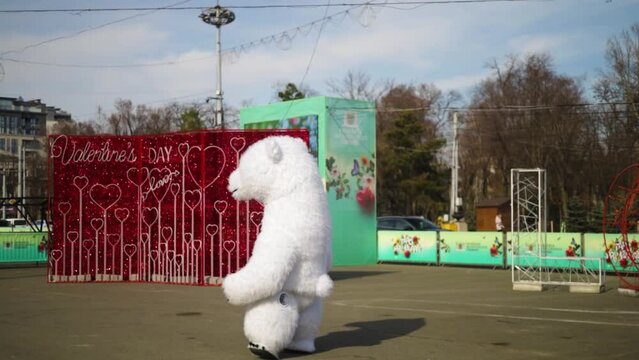 Polar bear mascot walking in the city of Chisinau, Moldova