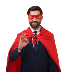 Happy businessman in red superhero cape and mask showing ok gesture on white background