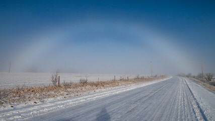 Ice rainbow in the winter along a roadway