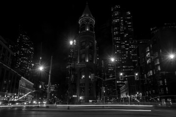  Night Toronto life - historical and contemporary downtown with streets ligtht. Black and white. Historic red bricks thin building at downtown Toronto.  - obrazy, fototapety, plakaty